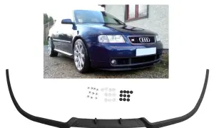 Granatowe Audi A3 8L z zamontowanym czarnym spoilerem przednim i akcesoriami montażowymi.