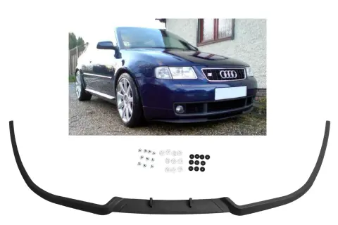 Granatowe Audi A3 8L z zamontowanym czarnym spoilerem przednim i akcesoriami montażowymi.